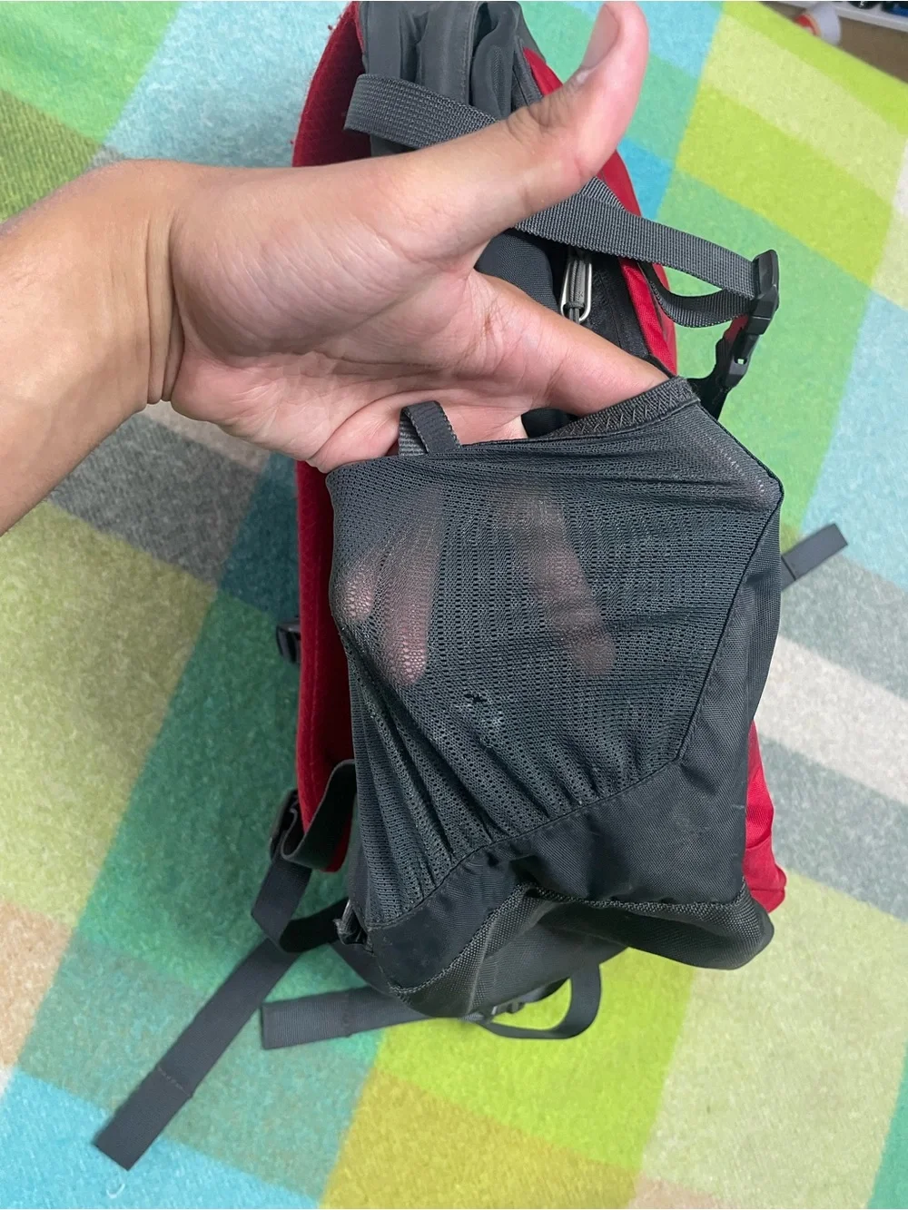 The North Face Recon backpack in charcoal gray and bright red